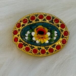 Vintage Italian glass micromosaic floral and gold tone brooch.